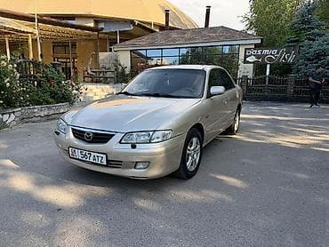 перекурить авто: Mazda Capella: 2000 г., Седан — 4