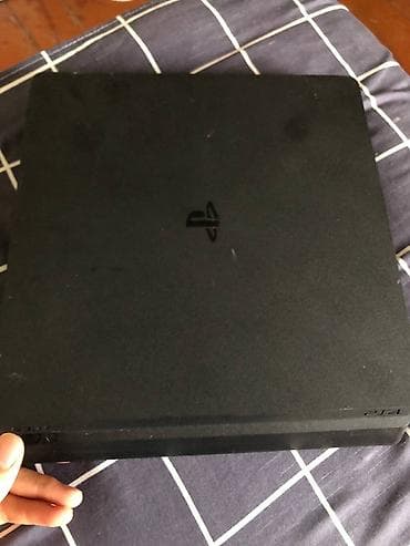 Игровая консоль Sony PlayStation 4 Slim (чёрная) с комплектом