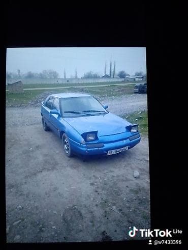 Mazda 323: 1992 г., 1.6 л, Кол менен иштөөчү, Бензин, Лифтбек
