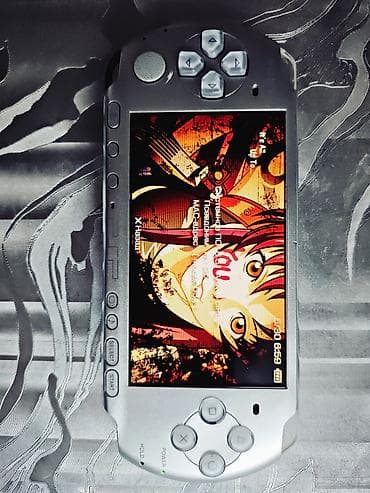 Портативная игровая консоль Sony PSP-3000 (серебристая/silver)