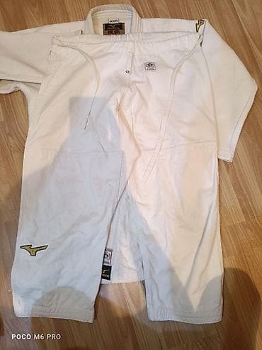 Музыкальные инструменты: Кимоно мизуно для дзюдо,на рост 150-160, лицензионноев отличном — 2