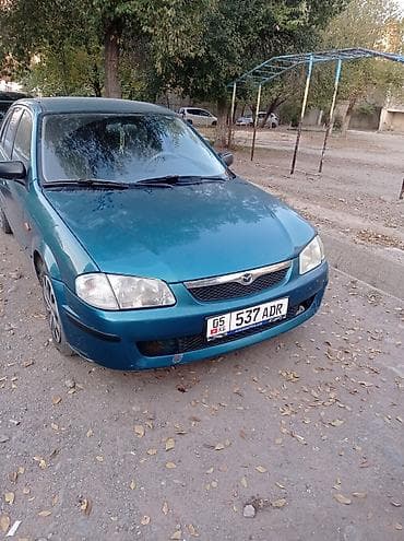 mazda 121: Mazda 323: 1999 г., 1.5 л, Ручные, Бензин, Хэтчбэк — 6