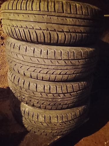 Колпаки: Комплект из 4 автомобильных шин (летний протектор). Характеристики: - — 1