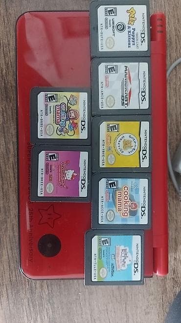 amazon kindle paperwhite: Nintendo DSi XL Limited Edition — Super Mario Bros. 25th Anniversary — 3