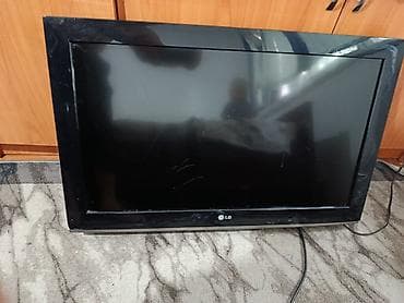 ТВ и видео: Телевизор LG, диагональ около 32" (серия с логотипом на нижней рамке) — 1