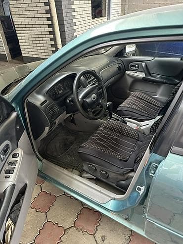 радар авто: Mazda 323: 2001 г., 1.6 л, Автомат, Бензин, Универсал — 7