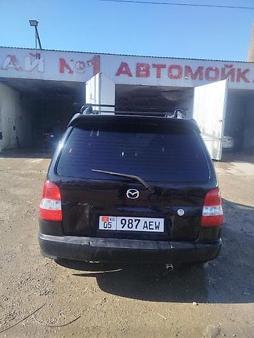 Mazda Demio: 2002 г., 1.5 л, Механика, Бензин, Хэтчбэк — 1
