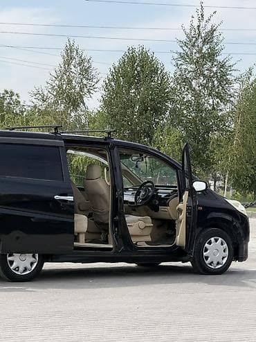 панель на cefiro: Honda Stepwgn: 2005 г., 2 л, Автомат, Бензин, Минивэн — 7