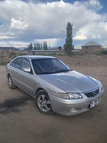 илизон машына: Mazda Capella: 1998 г., 2 л, Кол менен иштөөчү, Бензин, Седан — 2