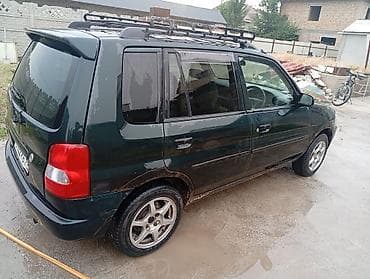 митсубиси спейк стар: Mazda Demio: 1997 г., 1.3 л, Автомат, Бензин — 3