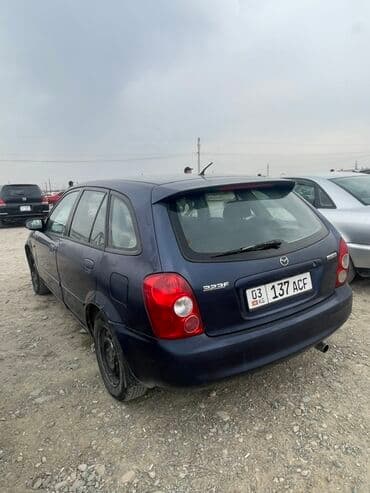 ручка нексия: Mazda 323: 2003 г., 1.6 л, Механика, Бензин, Хетчбек — 1