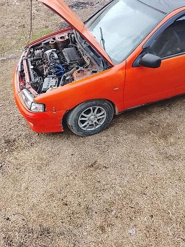 выхлопы: Nissan Primera: 1996 г., Седан — 4