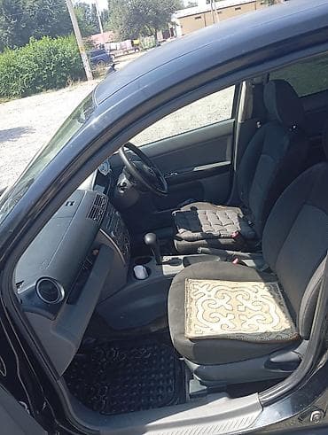 даихатсу сирион: Mazda Demio: 2005 г., 1.3 л, Автомат, Бензин, Хэтчбэк — 4