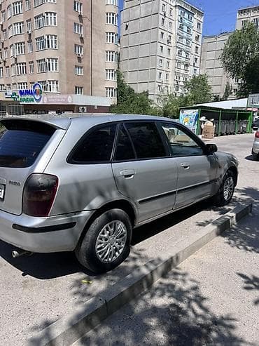 сузики вагон: Mazda 323: 2000 г., 1.6 л, Механика, Бензин, Универсал — 7