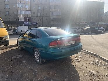 Mazda 626: 1996 г., 1.8 л, Механика, Бензин, Седан