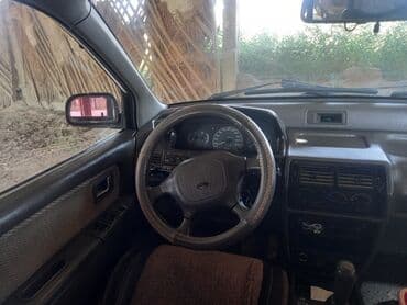 доставка аккумулятора бишкек: Просторный минивэн белого цвета с рейлингами на крыше — 8