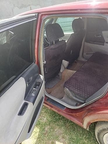 лабо 2004: Toyota Opa: 2001 г., Универсал — 9