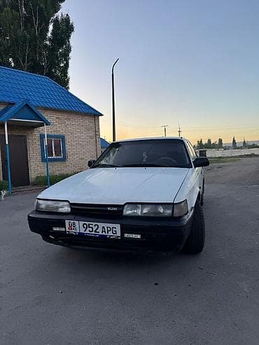 step wgn: Mazda 626: 1990 г., 2 л, Механика, Бензин, Седан — 5