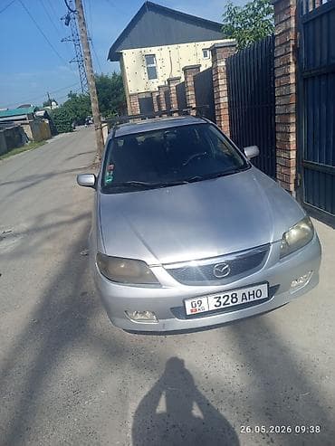 dot 4: Mazda 323: 2002 г., 1.6 л, Механика, Бензин, Универсал — 7
