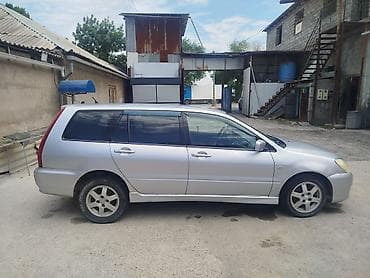 шины колеса: Mitsubishi Lancer: 2003 г., 1.6 л, Механика, Бензин, Универсал — 2