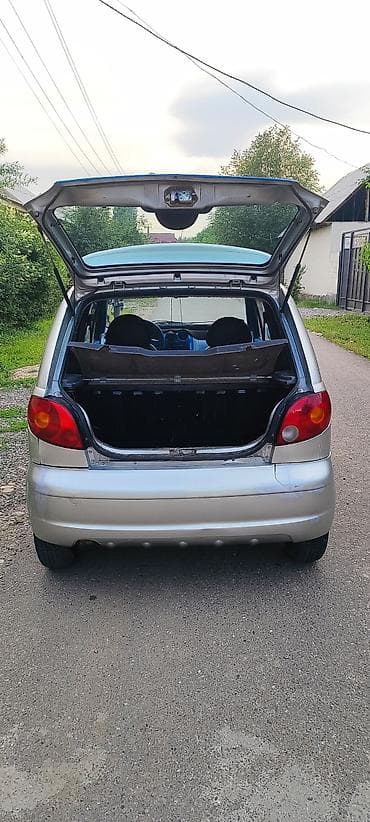 Унаа: Daewoo Matiz: 2002 г., 0.8 л, Кол менен иштөөчү, Бензин, Хетчбек — 6