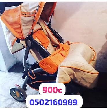 коляска летние: Прогулочная коляска оранжево‑бежевая. Основные характеристики: - Тип — 1