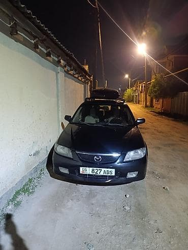 Mazda 323: 2002 г., 1.6 л, Автомат, Бензин, Универсал — 5