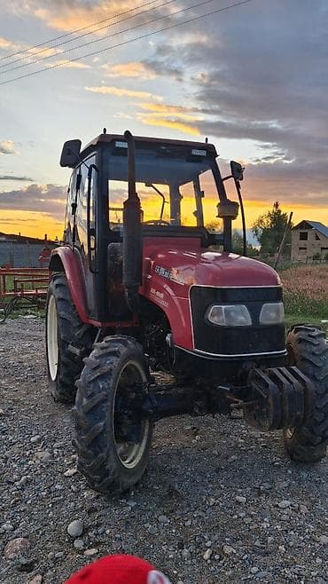 мотор авто: Колесный трактор с кабиной, полный привод 4x4. Серия на борту: 554 — 6