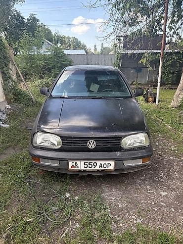 x 7: Volkswagen Golf: 1993 г., Механика, Хэтчбэк — 1