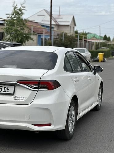 corolla 2016: Toyota Corolla: 2022 г., 1.8 л, Вариатор, Гибрид, Седан — 5