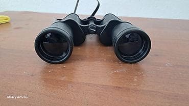 Бинокль классической порorro‑конструкции с центральной фокусировкой и