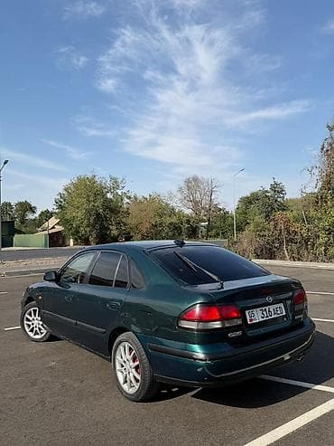 spark 2012: Mazda 626: 1997 г., 1.8 л, Механика, Бензин, Седан — 5