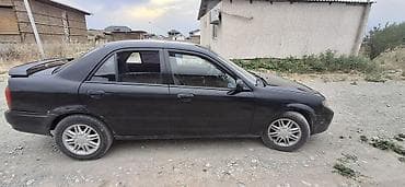 familia: Mazda Familia: 2001 г., Автомат, Бензин, Седан — 3