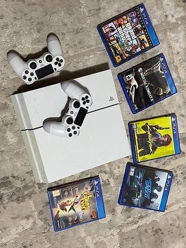 PlayStation 4 (белая) с аксессуарами и играми Комплектация: - Консоль at lalafo.kg PlayStation 4 (белая) с аксессуарами и играми Комплектация: - Консоль