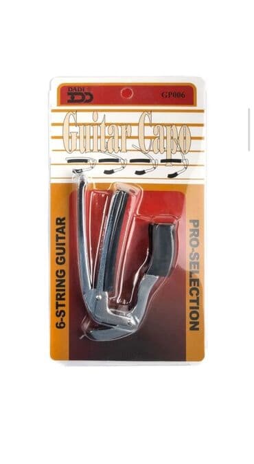 купить струну для гитары: Оригинальные каподастры, универсальные, прочный металл, обмен на — 4