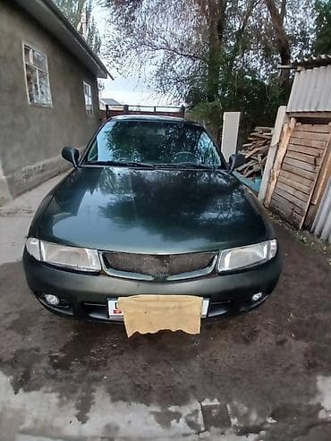 Mazda : 1995 г., 1.6 л, Механика, Бензин, Седан — 2