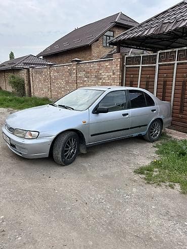 купить nissan: Нисан Алмера Седан серебристого цвета на легкосплавных дисках - Кузов — 2