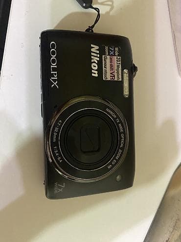 Компактная фотокамера Nikon COOLPIX. Характеристики с корпуса: - — 2