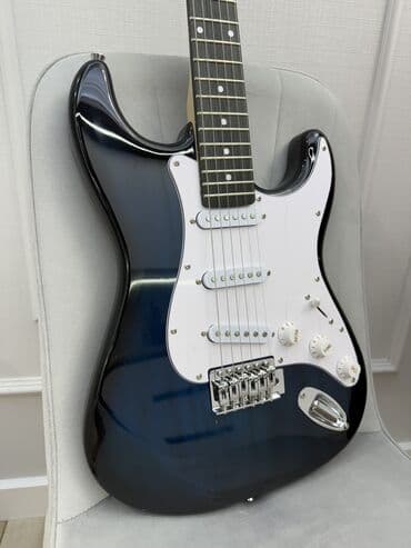 купить струны для гитары: Электрогитара новая. Тип стратокастер, ST, Stratocaster. В комплекте — 2