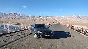 авто марк 2: Mazda Familia: 2002 г., 2 л, Автомат, Бензин, Универсал — 3