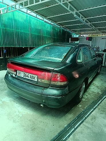 атего 1229: Mazda 626: 1993 г., Механика, Седан — 4