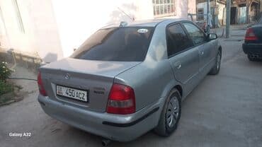 мазда кронус: Mazda 323: 2001 г., 1.6 л, Механика, Бензин, Седан — 5