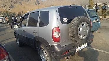 yuan plus byd: Chevrolet Niva: 2011 г., 1.7 л, Механика, Бензин, Внедорожник — 4