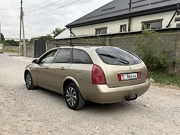 terrano 2: Nissan Primera: 2003 г., 2 л, Механика, Бензин, Универсал — 3