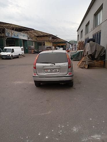 terrano 2: Nissan Almera Tino: 2002 г., Автомат, Газ — 4