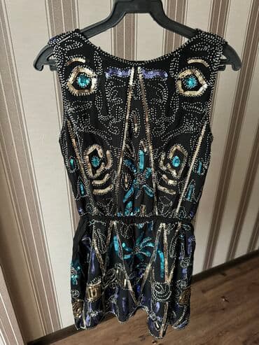 черное короткое платье с открытой спиной: Продаю очень красивое платье,размер подойдет на S и М — 1