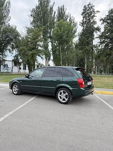 mistra: Mazda 323: 2003 г., 1.6 л, Автомат, Бензин, Универсал — 7