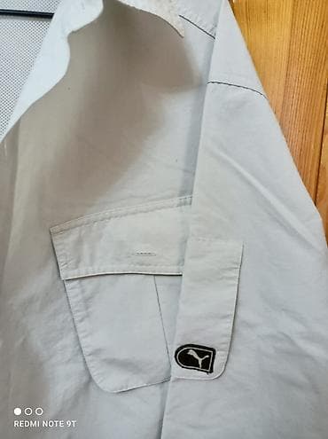 Шорталар: Рубашка Puma L (CAN/G), светло‑серая - Классический крой с отложным — 3