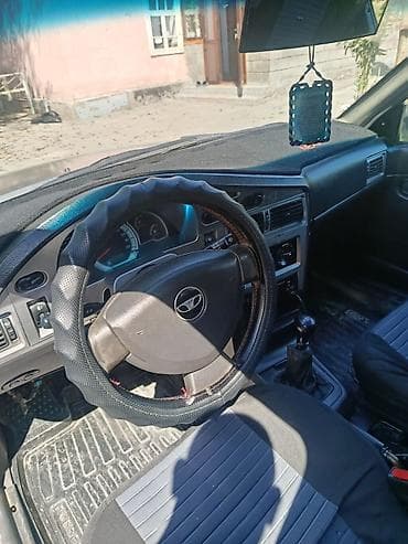 неки: Daewoo Nexia: 2008 г., Седан — 5