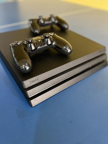 14 pro 256: PlayStation 4 Pro (PS4 Pro) с двумя беспроводными контроллерами — 1